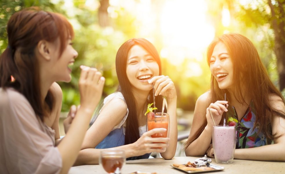 Women having drinks outdoors