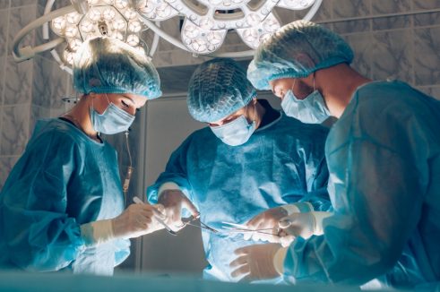 Surgeons in operating room