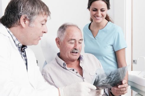 dentists talking to a patient