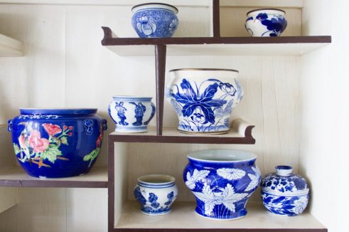 porcelain ceramic bowls on shelves