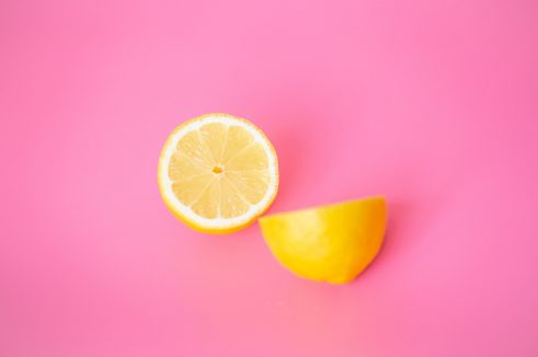 lemons over pink background
