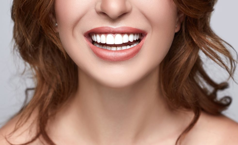 person with staright, white teeth