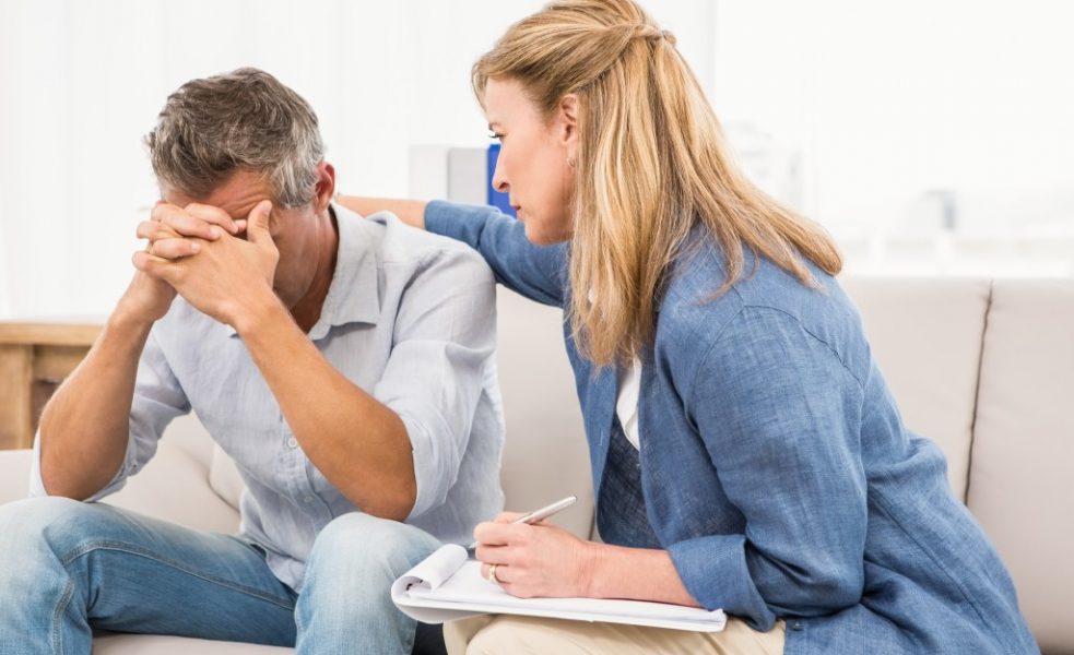 man having a treatment with his psychiatrist