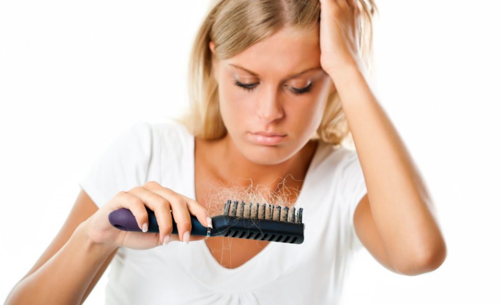 woman checking her comb